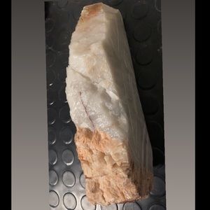 Polished Faded Rose Quartz with an orange stone